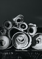 Rolled newspapers