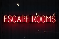 Neon panel with word Escape Rooms